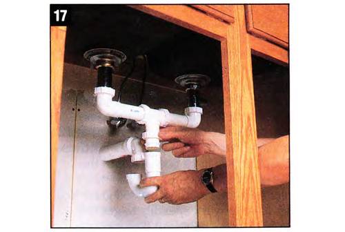 Hook up hot and cold lines first and the drain afterwards