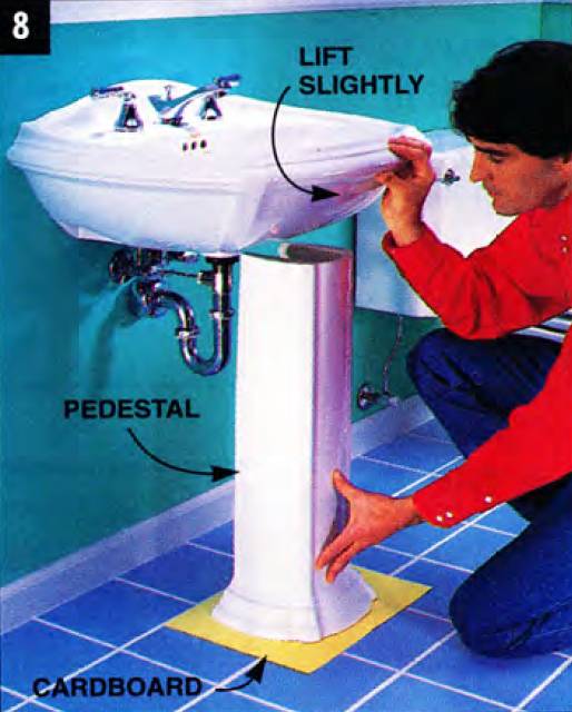 Lift the sink slightly and place the pedestal underneath. Use a cardboard to slide the pedestal and avoid scratching your floor