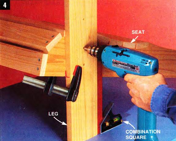 Use a combination square to position the leg, clamp it to the seat, and drill the bolt holes