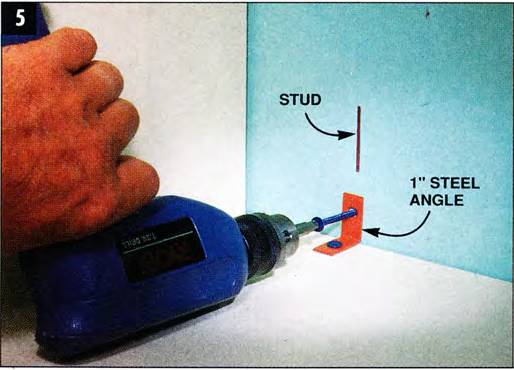 Use steel angle to attach the tower to the wall studs