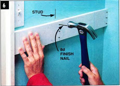 Nail cleats in at least two wall studs to support shelving and clothing rods