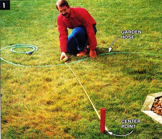 Use a garden hose to form curves and a 2x4 to form straight lines