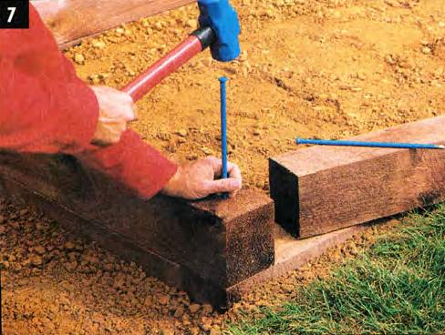 Install landscape timbers if you need to change levels, and make sure to overlap corners