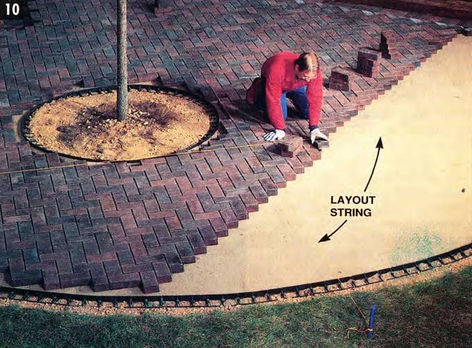 Use a layout string to continue laying pavers and keep them aligned as you work further away from the initial edge