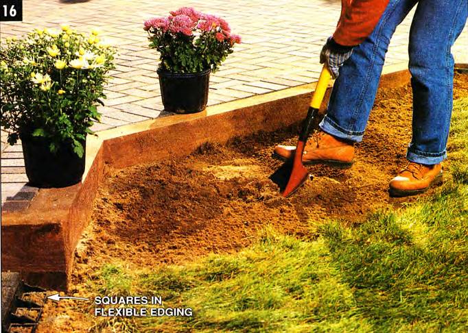 Keep the dirt away from the plastic edging to allow rainwater to drain from the patio