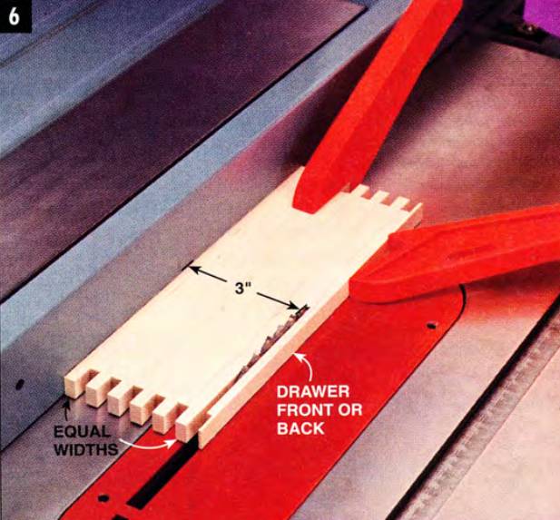 Trim off the width on the drawer and leave the outside finglers (or slots) with the same width
