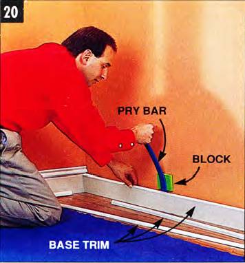 Use a pry bar to remove the base trim carefully, so you can reuse it later