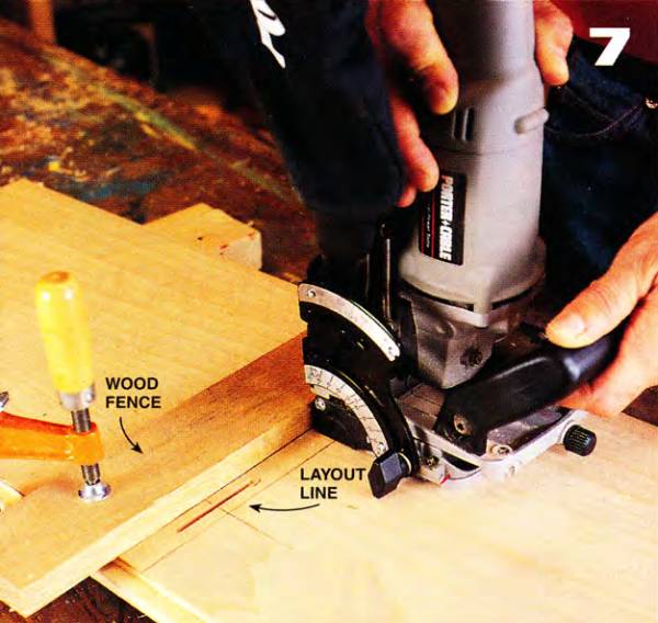 use a temporary wood fence to help you align the biscuit joiner and create the slot