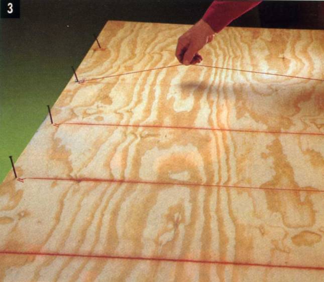 Mark the joist and stud centers on plywood with your chalk box