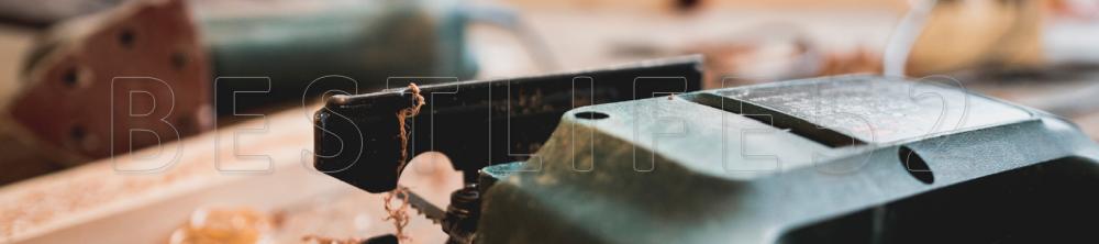 closer look at a jigsaw laying over a workbench