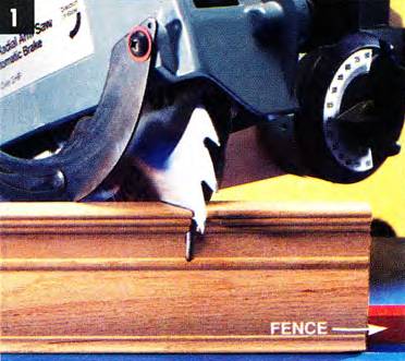 Hold the lumber firmly against the fence for precise miter cuts