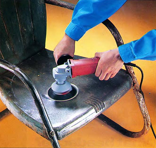random orbit sander in use polishing a chair