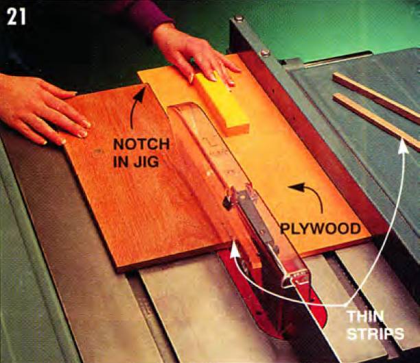 Make a notched piece of plywood with a handle to cut thin strips safely
